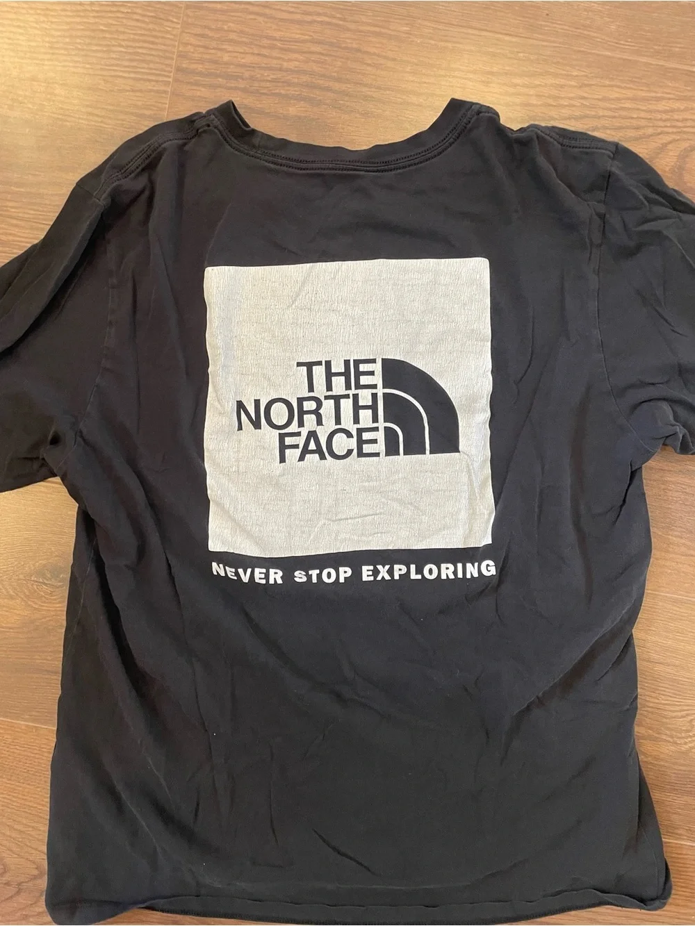 The North Face Black Graphic Tee - 'Never Stop Exploring'
